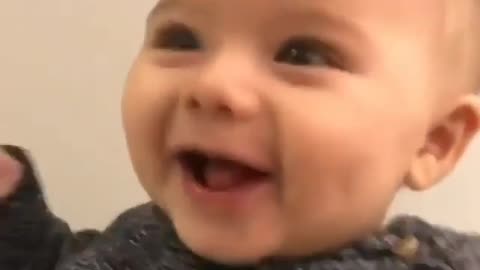 Baby boy laughing