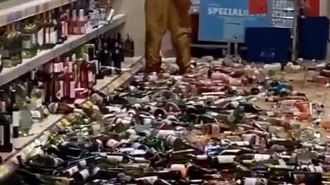 Crazy Lady Breaks Every Bottle in the Wine aisle.
