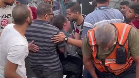 Child pulled from rubble after Israeli bombing