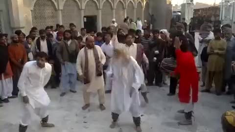 old man dancing in pakistan on village fear