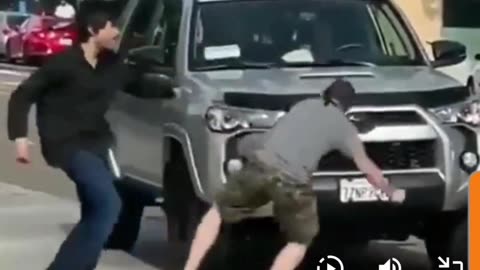 Knockout Blow: Epic Roadside Brawl Ends in Hilarious Fashion!