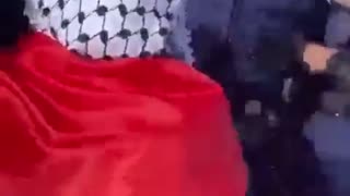 Police Officer Tackles Hamas supporter !