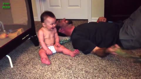 Babies laughing hysterically at dogs