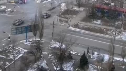 A pair of Ukrainian tanks firing at Russian forces in Mariupol, Ukraine