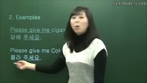 Asian lady talking about Coke