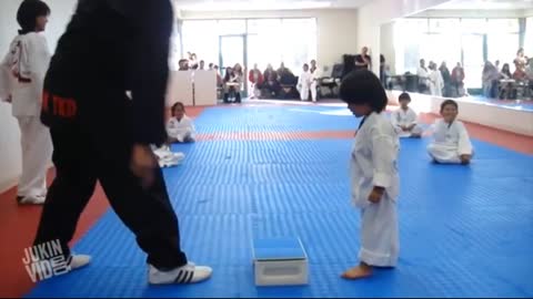 A funny Taekwondo little boy
