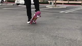 Upside down skateboard butt fall