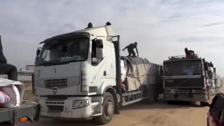 Trucks loaded with food aid entered the northern Gaza Strip this afternoon