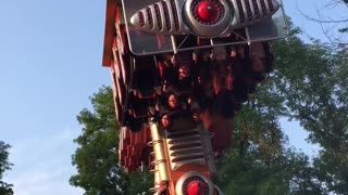 Amusement Park Ride Stops Upside-Down