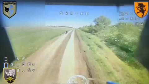 Russian on Motorcycle Crashes into Ukrainian Drone