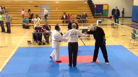 Professor lux winning a traditional karate tournament black belt fighting