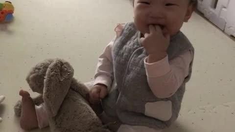 The child whose father's sneeze is funny