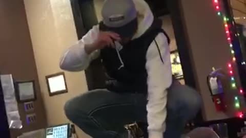 Drunk guy does a back flip off table, kicks tv and falls