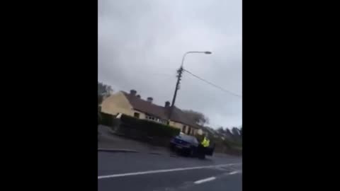 Gardai Irish Police Smash Man's Window