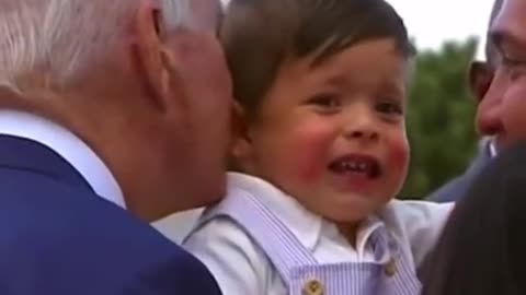 BABY is scared of Joe Biden while REACHING IN FOR A KISS