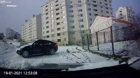 Situation Awareness Driver Reverses Away from Sliding Car