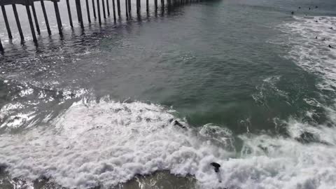 Kai Lenny surfing in Huntington Beach