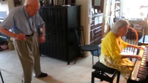 Talented Elderly Couple Dances And Plays Piano