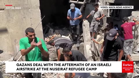 JUST IN: Gazans Deal With Aftermath Of Israeli Airstrike At Nuseirat Refugee Camp
