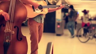 Playing Guitar In Subway