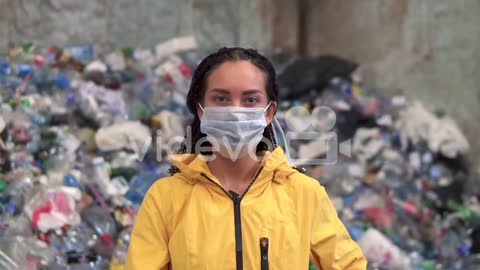 Young Woman Worker Putting On A Mask And Protective Eyeglasses