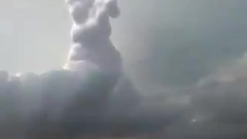 Who's Hand is this in the Clouds?