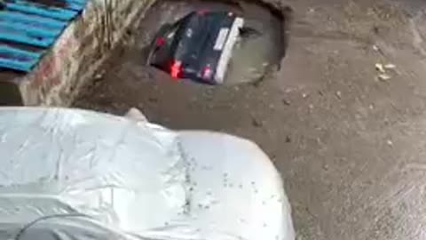 THE ROAD SWALLOWS THE CAR