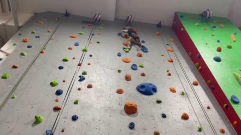 8yo attempts to climb a 30’ wall