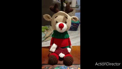 Crocheted elf in a shelf