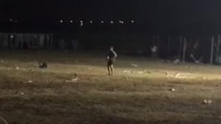 Guy alone in baseball field dancing