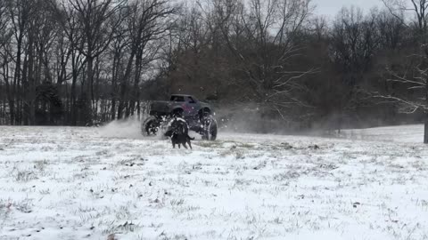 Monster Truck Doing Donuts in the Snow