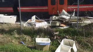 Train Trashes Boat Off Transporting Truck