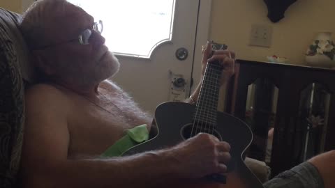 Dad playing guitar 7