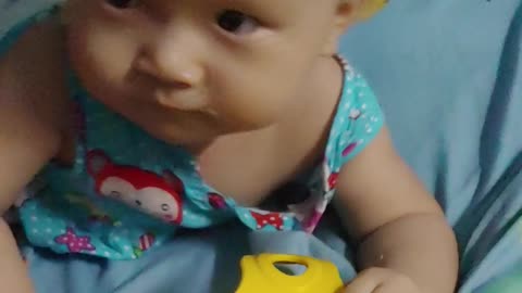 Baby eating potatoes