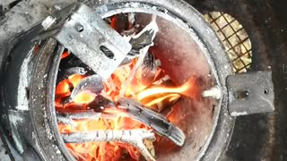 My home made Tin Can Stove in action.