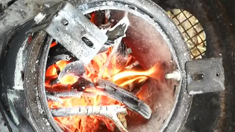 My home made Tin Can Stove in action.