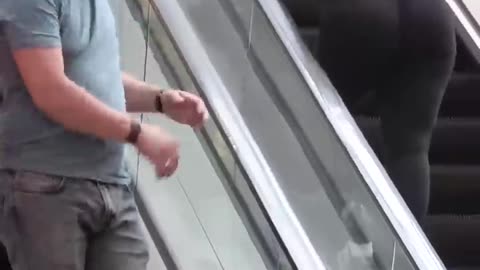 Touching hands escalator prank