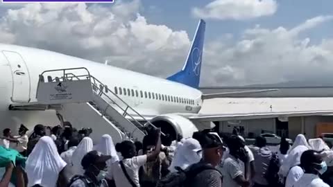 Haitian Migrants 4ssault Flight Crew And Hurl Objects At Plane 🟠⚪🟣The NPC Show