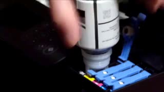 Refill ink in an Ecotank Printer