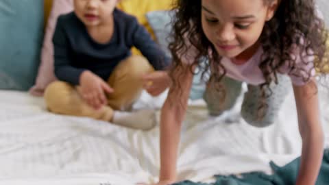 Cute cat and cute child playing