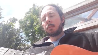 Outside in the Sun playing a relaxing tune