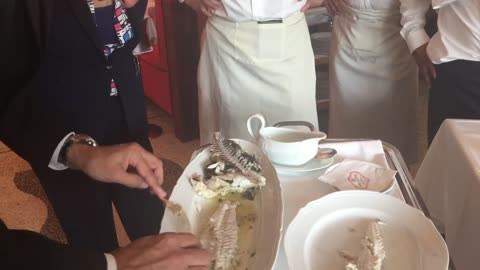 Filleting Branzino (Mediterranean Sea Bass) table side at Sant Ambroeus, Palm Be