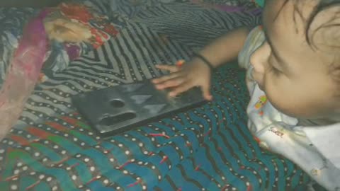 Very smart baby who playing alone