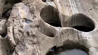 WATER MADE HOLES IN ROCK