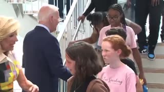 Joe Biden coughs all over kids at School. Who needs Masks?