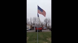 AN AMERICAN FLAG AND A CHRISTIAN FLAG