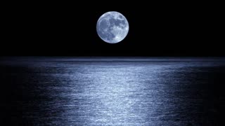 Full moon lights the ocean