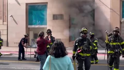 Fire from underground below Tiffany & Co. building in midtown Manhattan.