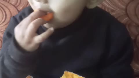Boy is fun with Cheese ring and lollypop
