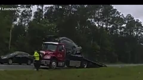 A woman gets distracted while driving as her car flys through the air!!!